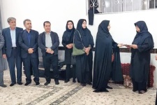 تجلیل از خانواده شهید امیررضا خسروی در گیلانغرب=عکس